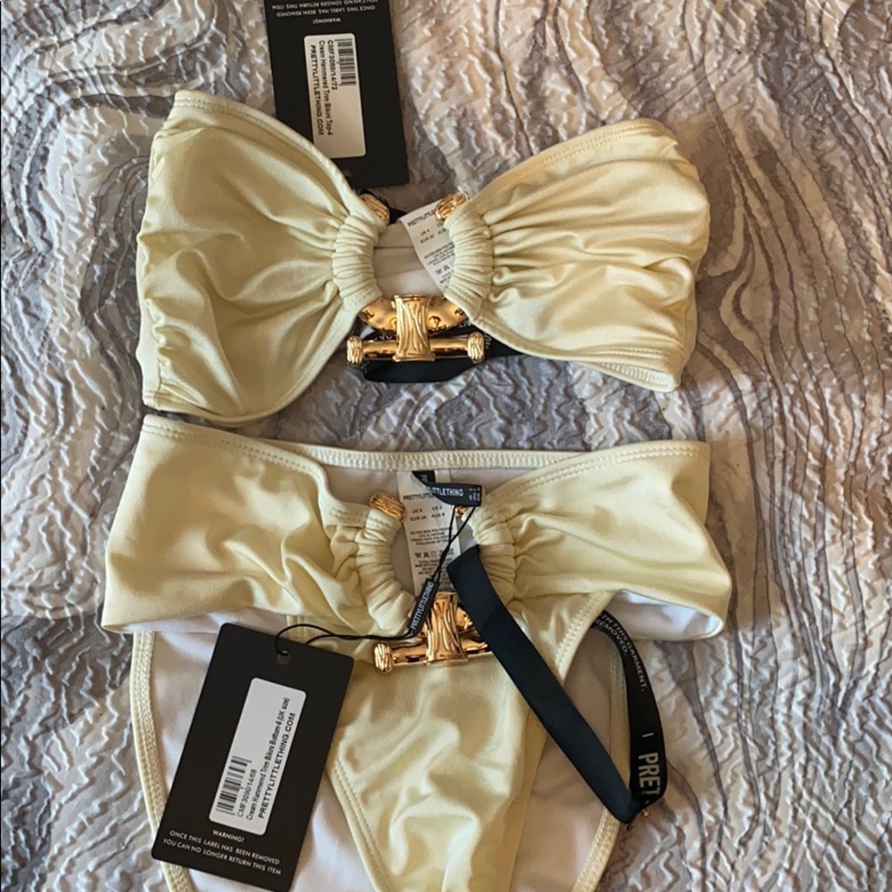 Cream bathing suit top and bottom different sizes